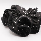 Chouchou en tissu à pois noir et blanc cousu à la main 